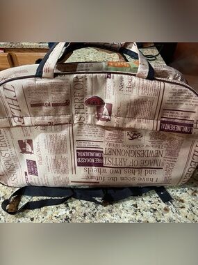Newspaper-Print Beige Travel Duffel Bag with Black Accents